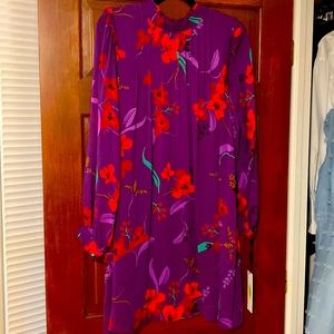 The perfect dress! Purple sheer sleeved above the knee dress! New with tags!